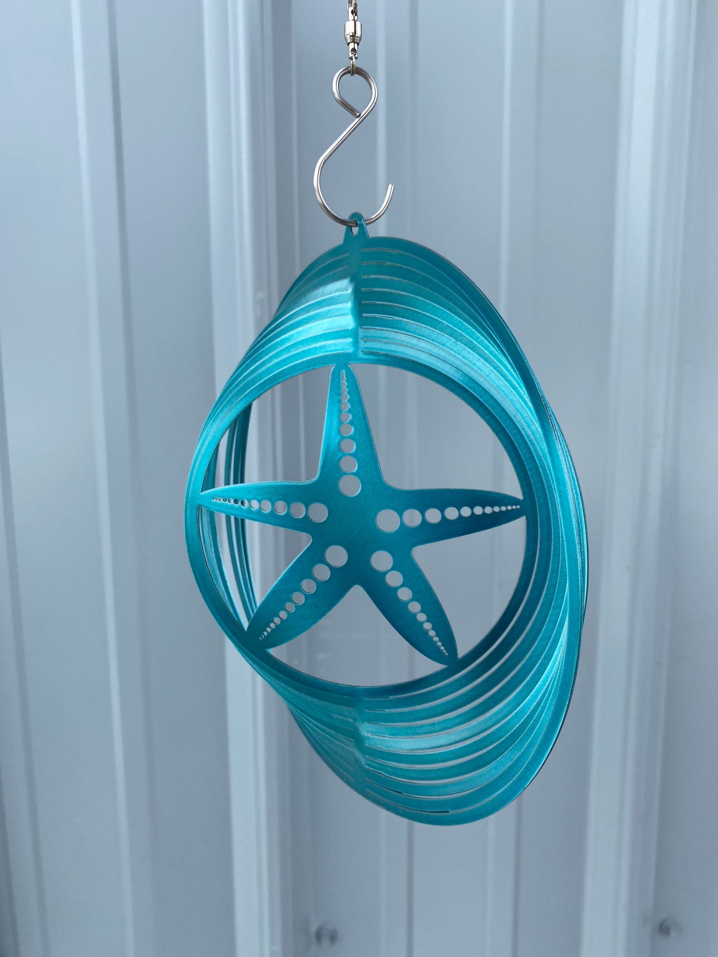 Star fish metal wind spinner, beach house decor, coastal themed decor, finding Nemo decor, children’s room decor